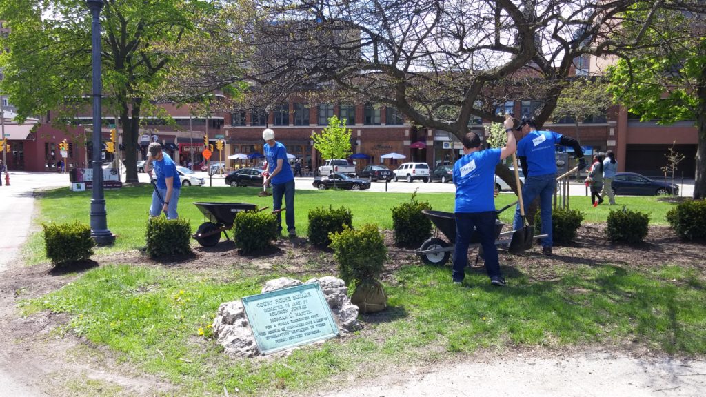 Robert W. Baird & Co. employees volunteering in Cathedral Square.